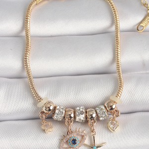 Pirinç Gold Renk Zincir Sallantı Zirkon Taşlı Göz Figür Yıldız Detay Kadın Bileklik